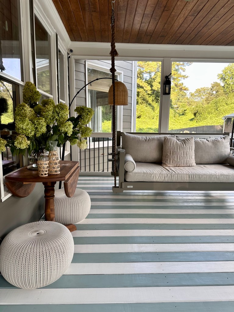 Stripped porch floor, bright colors. Adding interest to our screened porch with paint. 